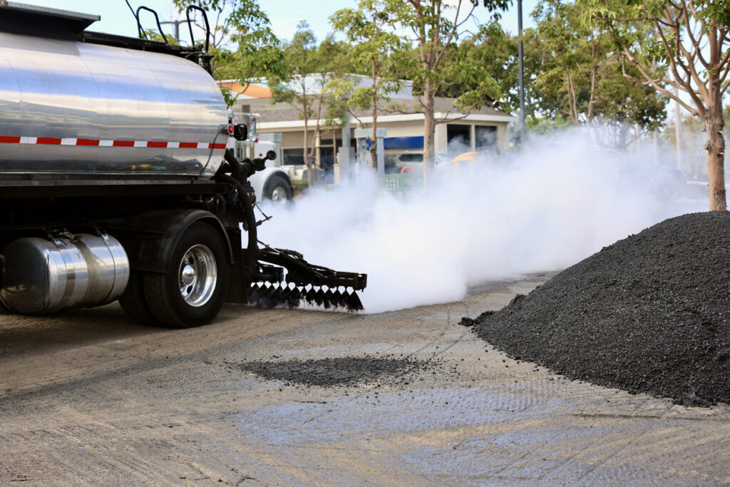 Truck laying down a layer of hot oil before the fresh asphalt Sripath asphalt additives can be used for formulate a variety of bitumen emulsions for paving.